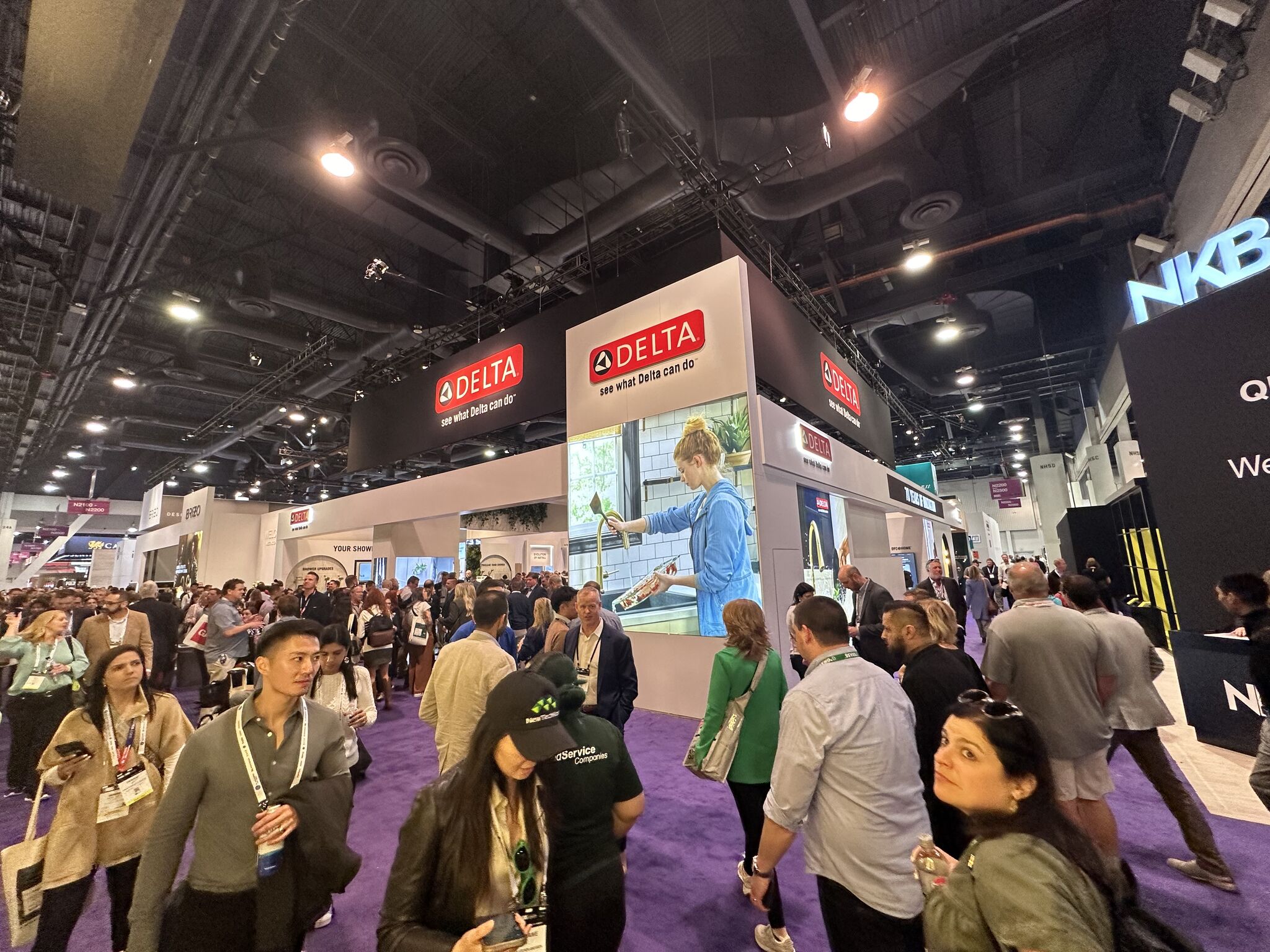 huge crowds at KBIS 2024 outside and inside Delta Faucet trade show exhibit